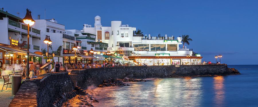 Night scene of the Playa Blanca resort, on the Lanzarote Island in the Canary Islands, Spain.