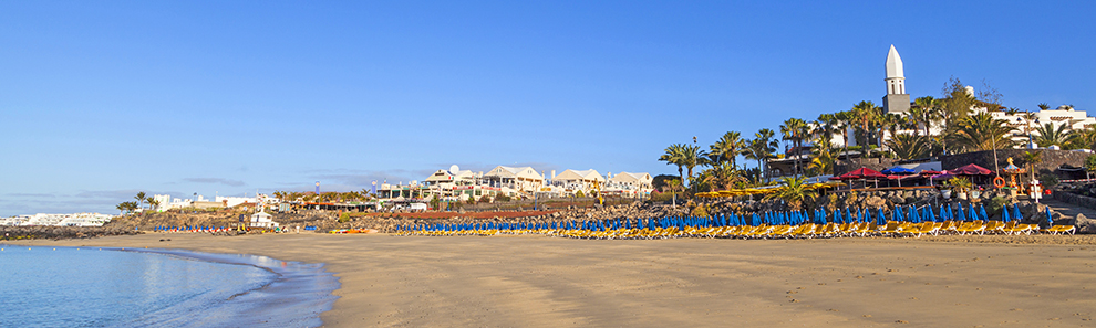 beach promenade of Playa Blanca without people in early morning