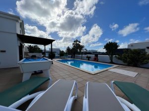 Bernice sun loungers and pool view